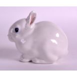 A SMALL ROYAL COPENHAGEN PORCELAIN FIGURE OF A RABBIT. 3.25ins wide.