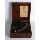 A BOXED 19TH CENTURY ENGLISH H HUGHES & SON LTD SEXTANT with fittings. Sextant 8.5ins wide.