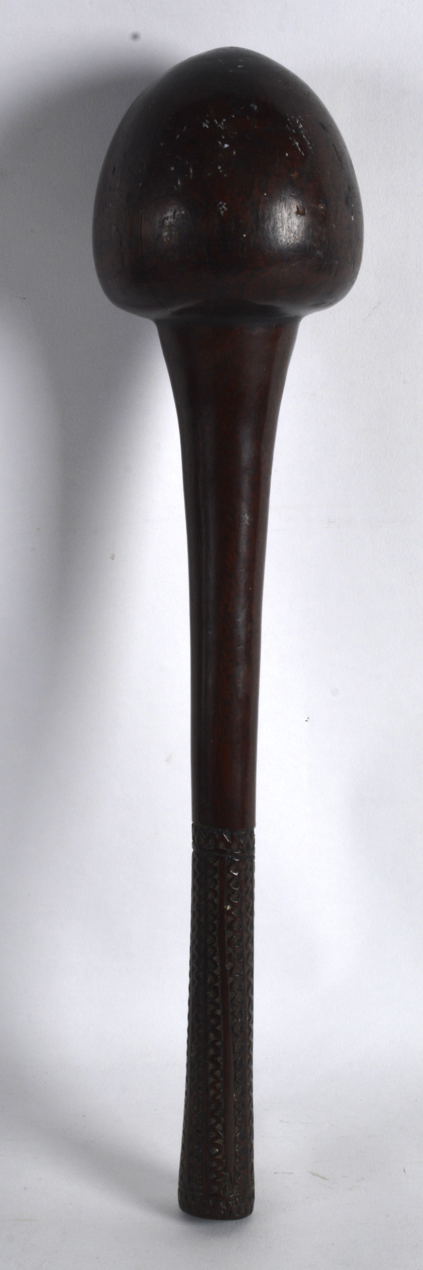 A GOOD 19TH CENTURY POLYNESIAN HEAVY WOODEN THROWING CLUB probably Tongan, with thick terminal,