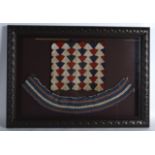 AN UNUSUAL FRAMED CACHE SEXE MODESTY APRON Northern Cameroon, decorated with motifs.