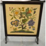 AN EDWARDIAN EMBROIDERED FIRESIDE SCREEN. 2Ft 4ins high.