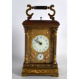 A GOOD EARLY 20TH CENTURY FRENCH QUARTER STRIKING BRONZE CARRIAGE CLOCK with elaborate art nouveau