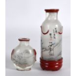 A CHINESE REPUBLICAN PERIOD REVERSE PAINTED FROSTED GLASS SNUFF BOTTLE together with another similar