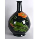 A STYLISH AUSTRIAN SECESSIONIST MOVEMENT POTTERY VASE decorated with stylish flowers. 10.25ins