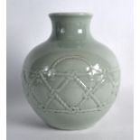 A CHINESE CELADON LATTICE BOUND BULBOUS VASE bearing Yongzheng marks to base. 7.25ins high.