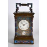 A SUPERB LARGE 19TH CENTURY FRENCH CHAMPLEVE ENAMEL CARRIAGE CLOCK within its original leather case,