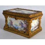 A GOOD 19TH CENTURY SWISS ENAMEL AND ORMOLU JEWELLERY CASKET with inset enamelled clock movement,