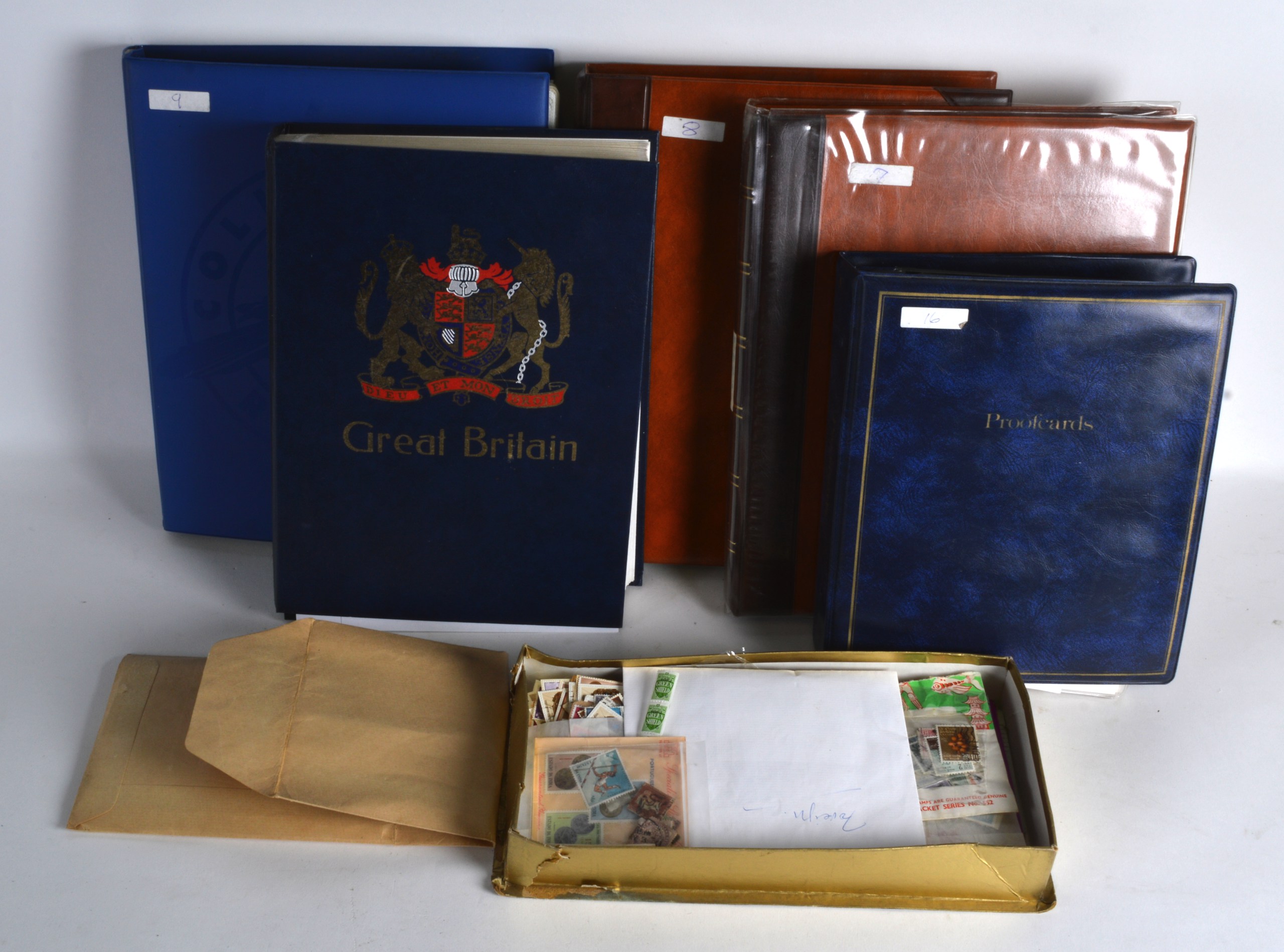 A LARGE COLLECTION OF VARIOUS WORLD STAMPS in four albums and loose in a box. (qty)