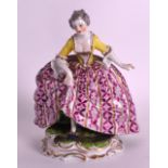 A 19TH CENTURY CONTINENTAL PORCELAIN FIGURE OF A FEMALE bearing pseudo Sevres marks to base. 5.25ins