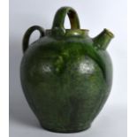 A LARGE FARNHAM POTTERY HIGH HANDLED JUG. 12.5ins high.