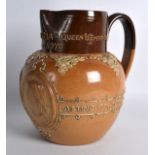 A 19TH CENTURY DOULTON STONEWARE 'QUEEN VICTORIA' JUG decorated with flowers and portraits. 7.