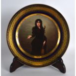 A LATE 19TH CENTURY VIENNA PORCELAIN CABINET PLATE painted with a pretty female holding an