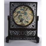 A GOOD 19TH CENTURY CHINESE FRAMED HONGMU AND SILKWORK SCREEN ON STAND decorated with extensive