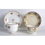 AN EARLY 19TH CENTURY SWANSEA PORCELAIN TEACUP AND SAUCER together with another teabowl and