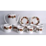 A SUSIE COOPER SIX PIECE RETRO TEASET decorated with flowers. (15)