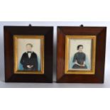 A PAIR OF EARLY 19TH CENTURY FRAMED PORTRAIT MINIATURES depicting a boy and girl within interiors.