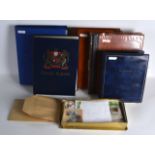 A LARGE COLLECTION OF VARIOUS WORLD STAMPS in four albums and loose in a box. (qty)