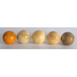 A SET OF FIVE 19TH CENTURY CARVED IVORY SNOOKER BALLS. 2.25ins diameter. (5)
