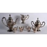 AN UNUSUAL LATE 19TH CENTURY CHINESE EXPORT SILVER COFFEE SERVICE with four matching cups, of