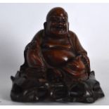 A 19TH CENTURY CHINESE CARVED HARDWOOD FIGURE OF A BUDDHA modelled upon a fitted hardwood base.