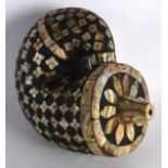 AN UNUSUAL ISLAMIC MOTHER OF PEARL INLAID POWDER FLASK of curving horn shape, decorated with star