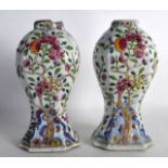 A PAIR OF 18TH CENTURY CHINESE LOBED VASES painted with peaches and flowers. 8.5ins high.