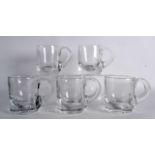 A SET OF FIVE 19TH CENTURY HEAVY CLEAR GLASS MUGS. (5)