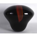 A STYLISH BLACK AND RED FLASH GLASS VASE. Signed. 7.75ins high.