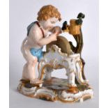 A 19TH CENTURY MEISSEN PORCELAIN FIGURE OF A YOUNG PUTTI modelled beside a grinding wheel, upon a