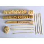 A MID 19TH CENTURY CHINESE CANTON CARVED IVORY NEEDLE CASE AND COVER decorated with dragons,
