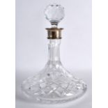 A MODERN SILVER MOUNTED DECANTER AND STOPPER. 10.25ins high.