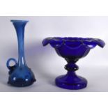 A BOHEMIAN BLUE GLASS COMPORT together with a blue vase. (2)