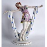 AN EARLY 20TH CENTURY ART DECO SITZENDORF FIGURE OF A FLAPPER GIRL modelled with arms