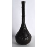 A 19TH CENTURY JAPANESE MEIJI PERIOD IRON VASE of bulbous form with cylindrical neck, decorated with