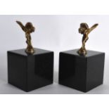 A PAIR OF ROLLS ROYCE SPIRIT OF ECSTASY FIGURES supported upon black marble bases. 6.25ins high.