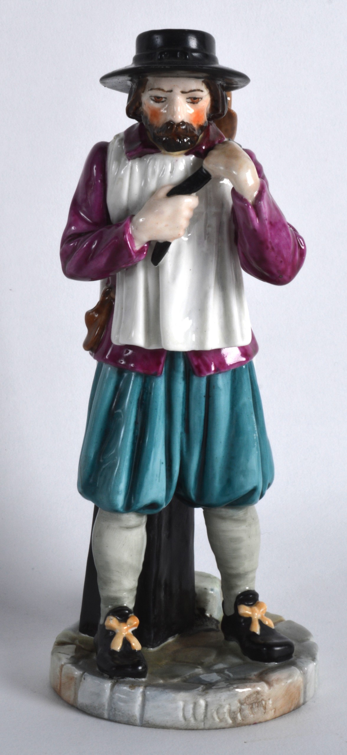 A ROYAL WORCESTER FIGURE OF LONDON CRIES 'YE WATER CARRIER' modelled by James Hadley C1931. 6.