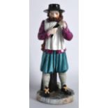 A ROYAL WORCESTER FIGURE OF LONDON CRIES 'YE WATER CARRIER' modelled by James Hadley C1931. 6.