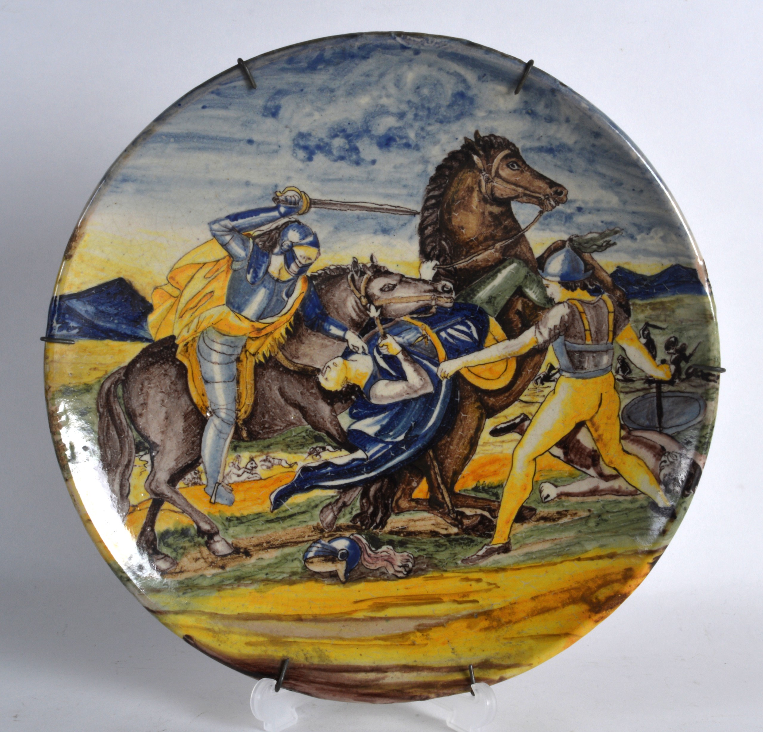 A GOOD 18TH/19TH CENTURY EUROPEAN FAIENCE MAJOLICA CIRCULAR CHARGER painted with figures on