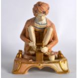 A RARE ROYAL WORCESTER FIGURE OF AN INDIAN CRAFTSMAN C1907 shape 1204. 5.25ins high.