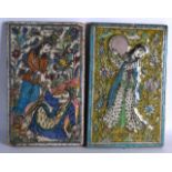 A PAIR OF PERSIAN PORTRAIT/FIGURAL TILES painted with figures within landscapes and foliage. Each