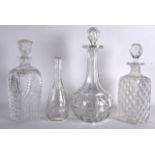 A GOOD QUALITY 19TH CENTURY DECANTER AND STOPPER together with three others. Largest 1ft 1ins