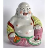 A CHINESE REPUBLICAN PERIOD PORCELAIN FIGURE OF A BUDDHA painted with floral sprays. Signed. 9.25ins