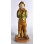 A ROYAL WORCESTER FIGURE OF THE IRISHMAN C1898 decorated in gilt enamel. 6.75ins high.