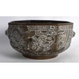 A LATE 19TH CENTURY CHINESE OCTAGONAL BRONZE CENSER bearing Xuande marks to base, decorated with a