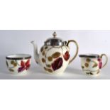 A VICTORIAN WEDGWOOD SILVER MOUNTED THREE PIECE TEASET painted with acorns and vines. (3)