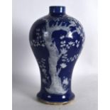 AN 18TH CENTURY CHINESE BLUE GROUND BALUSTER VASE Qianlong, painted with flowering trees. 8.75ins