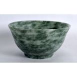 AN EARLY 20TH CENTURY CHINESE CARVED HARDSTONE BOWL. 3.75ins diameter.
