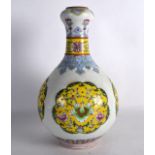 A CHINESE FAMILLE ROSE PORCELAIN VASE 20th Century, painted with yellow floral panels. 11.5ins