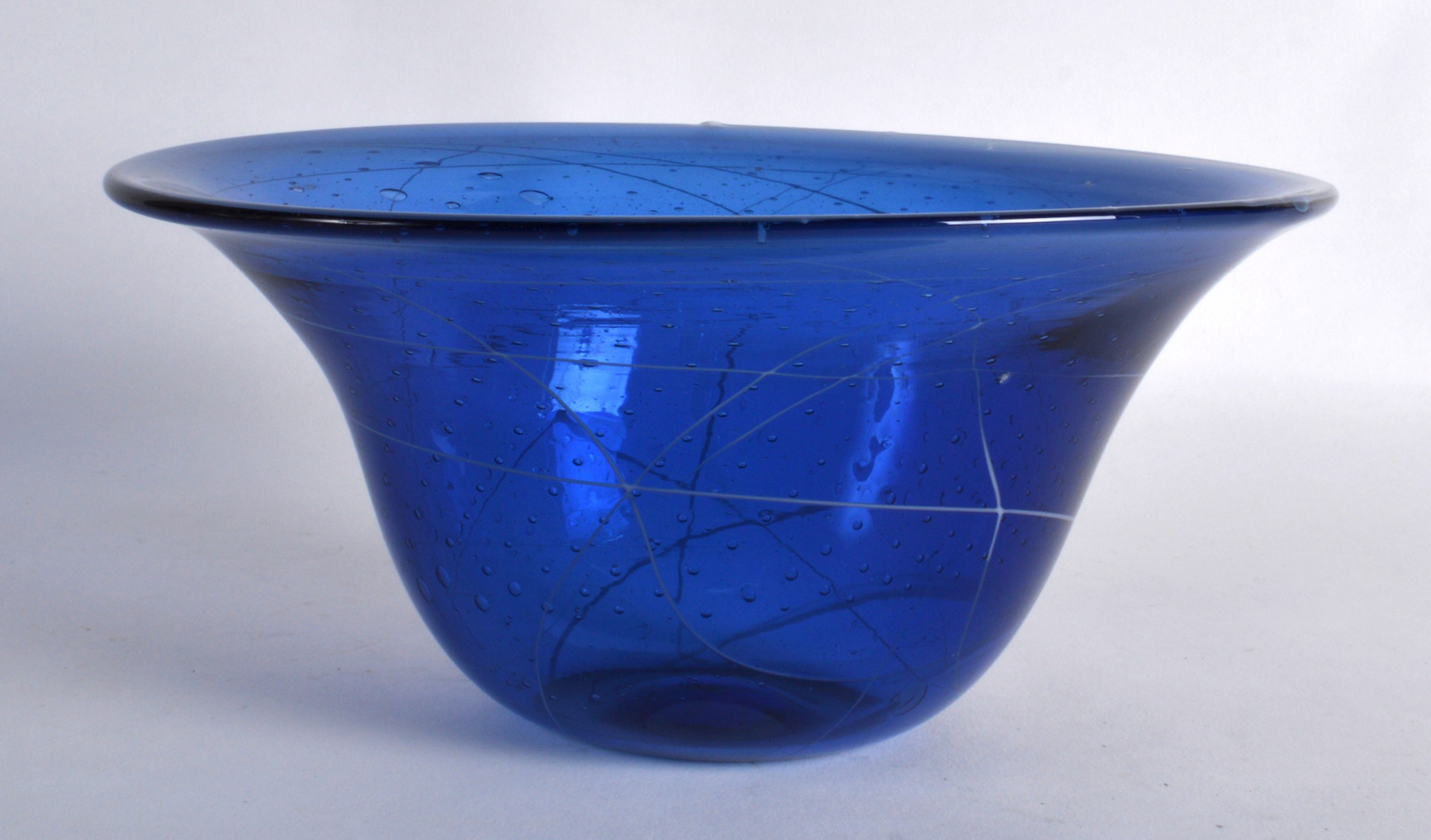 A BLUE ART GLASS BOWL with swirling decoration. 8.5ins wide.
