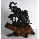 A GOOD LARGE 19TH CENTURY JAPANESE MEIJI PERIOD BRONZE FIGURE OF AN ELEPHANT modelled being attacked
